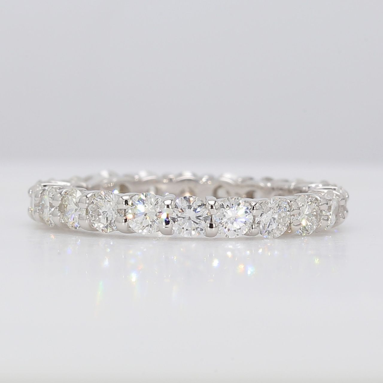 Eternity band with shared prong set round diamonds.  D1.68ct.t.w.  Size 5.5