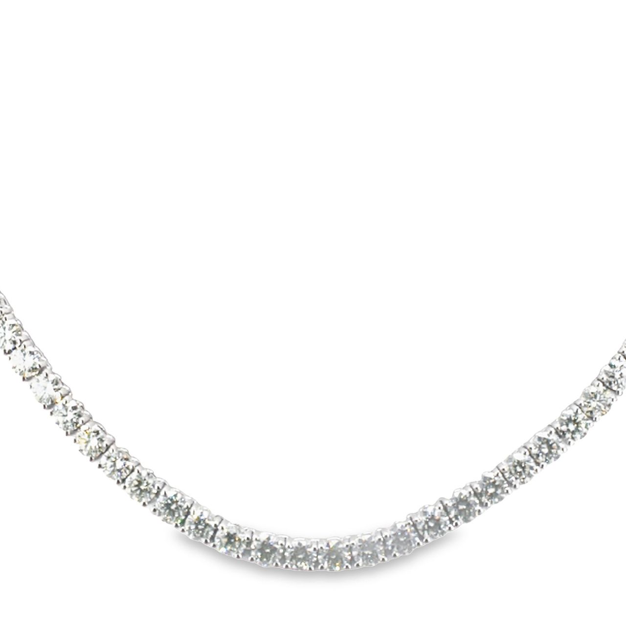 16.5' Half way tennis necklace with basket prong set (53) round diamonds.  D8.56ct.t.w.