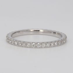 Eternity band in 18K WG with prong set round diamonds.  D0.45ct.t.w.  Size 5.25