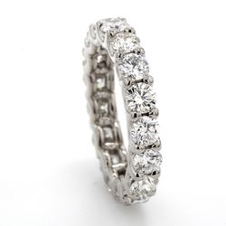 Eternity band in 18K WG with shared U-prong set (19) round diamonds.  D1.81ct.t.w.  Size 4.5