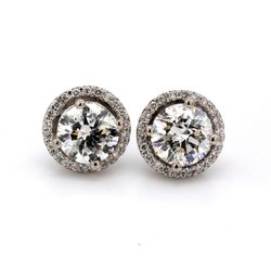 Halo stud earrings with prong set rounds around USA certified F-G/SI3 round diamonds.  D1.86ct.t.w.