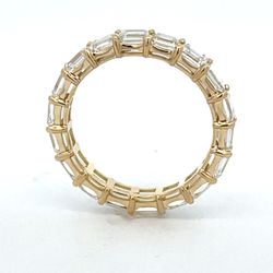 Eternity band east west style in 18K YG with basket prong set (18) emerald cut diamonds.  D2.48ct.t.w.  Size 5
