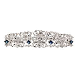 7' Butterfly links bracelet in 18K WG with round diamonds & sapphires.  D0.63ct.t.w.  Sapphires 2.37ct.t.w.