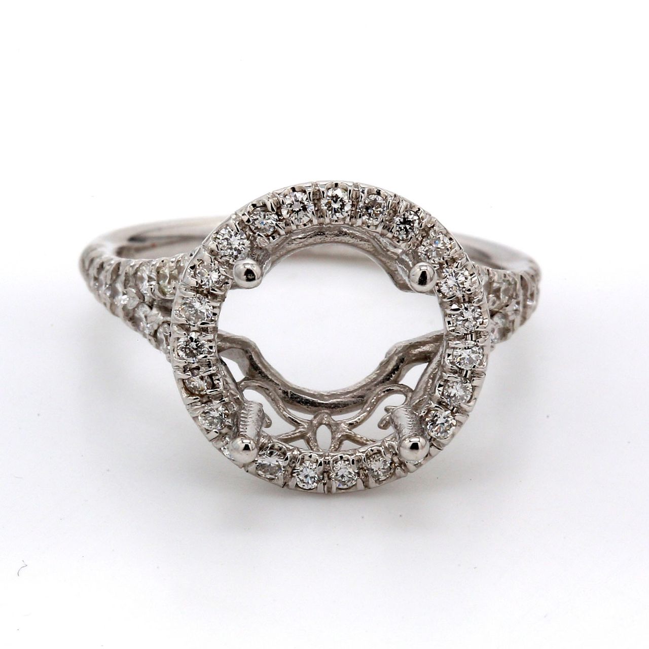 Halo split shank semi mount in18K WG with U-prong set round diamonds.  D0.58ct.t.w.