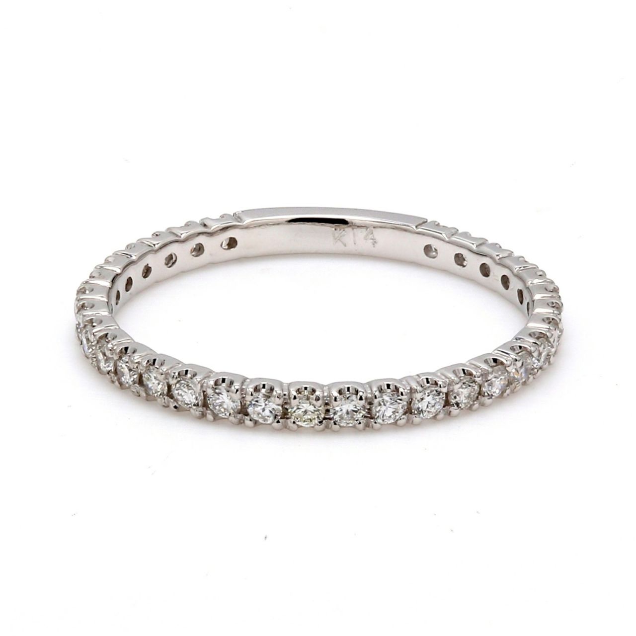 Band with 4-prong set (31) round diamonds.  D0.37ct.t.w.  Size 6.75