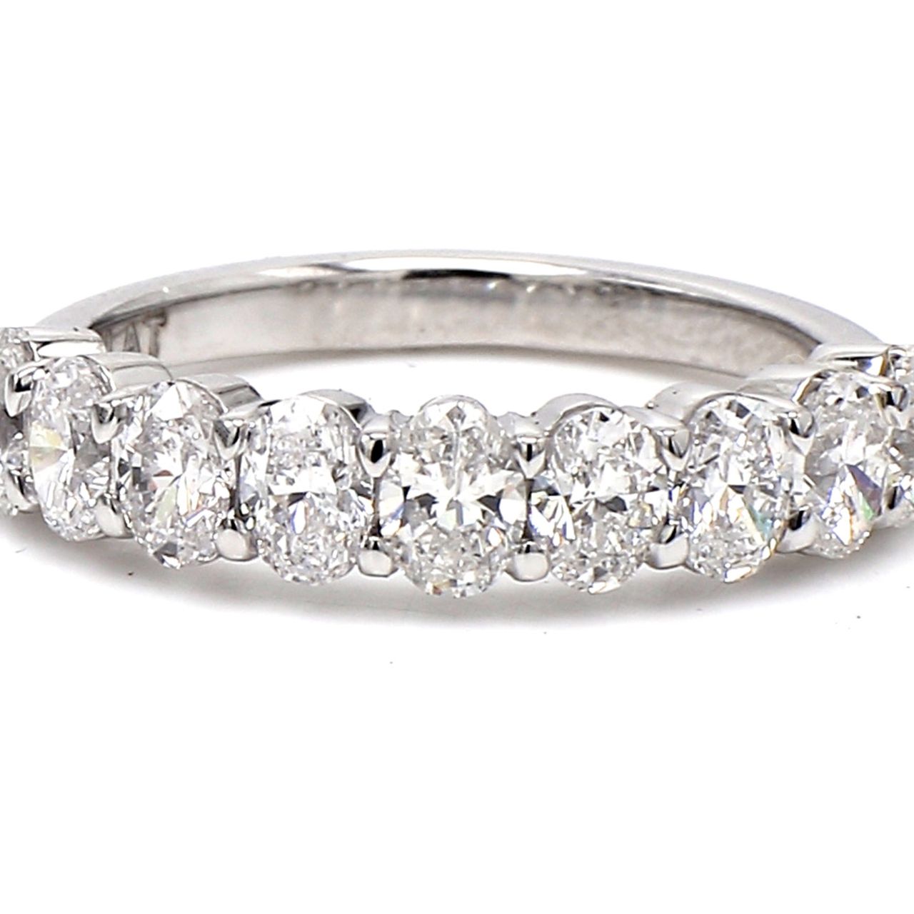 9-stone band in platinum with prong set oval cut diamonds.  D1.69ct.t.w.  Size 7