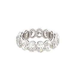Eternity band in platinum with basket prong set GIA certified G-I /VVS1-SI1 (15) oval diamonds.  D5.99ct.t.w.  Size 5.25