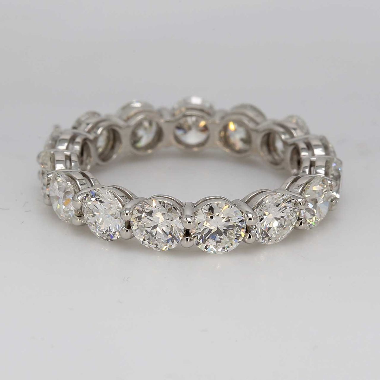 Etenity band in platinum with double basket shared prong set round diamonds.  D3.56ct.t.w.  Size 5.25