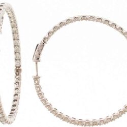 1.75' Inside out hoop with prong set (56) round diamonds.  D11.14ct.t.w.