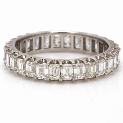 Eternity band in 18K WG with U-prong set (28) emerald cut diamonds.  D2.45ct.t.w.  Size 6