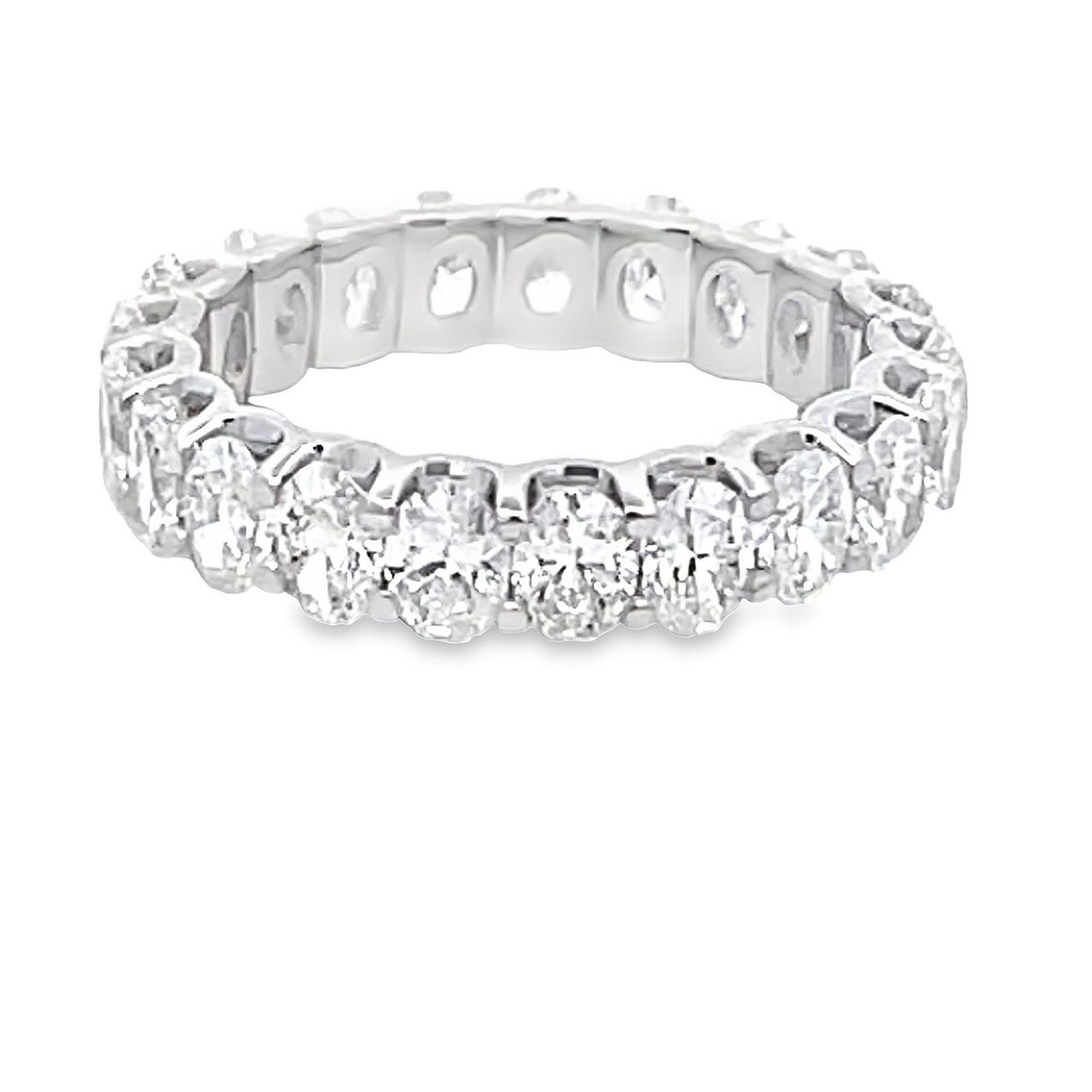 Eternity band with U-prong set (21) oval diamonds.  D2.87ct.t.w.  Size 4.75