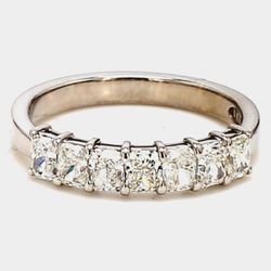 7-stone band in platinum with basket prong set radiant cut diamonds.  D1 00ct.t.w.  Size 5.5