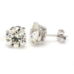 Push back stud earrings with 4-prong set round diamonds.  D4.05ct.t.w.