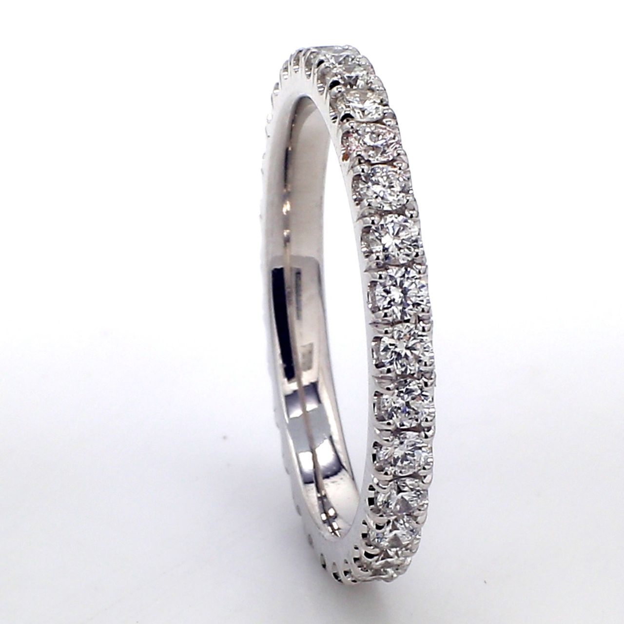 Eternity band in 18K WG with U-prong set (30) round diamonds.  D0.84ct.t.w.  Size 6