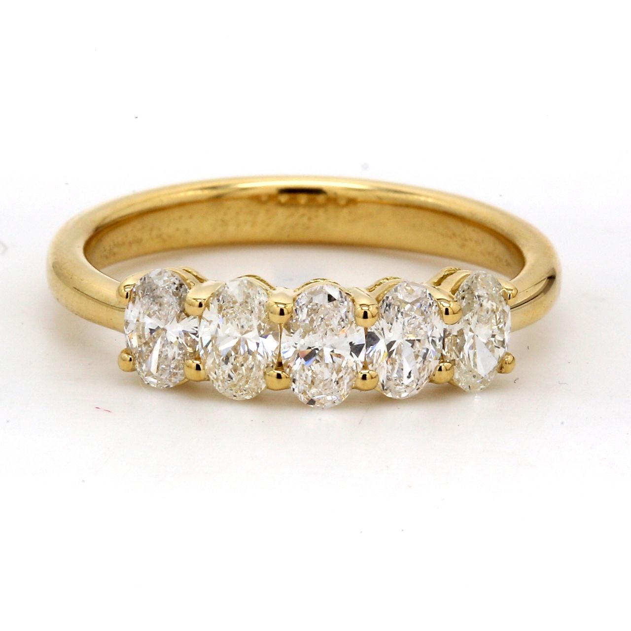5-stone band in 18K YG with basket shared prong set oval cut diamonds.  D1.03ct.t.w.  Size 6