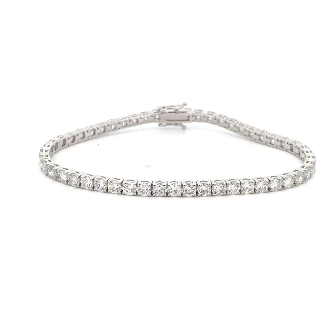 7' Tennis bracelet with 4-prong set (51) round diamonds.  D6.82ct.t.w.