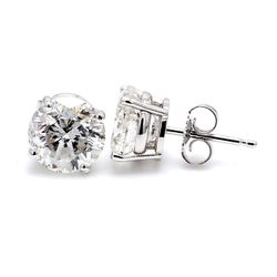 Push back stud earrings with 4-prong set round diamonds. D0.93ct.t.w.