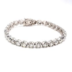 7.5' Tennis bracelet with crown head prong set (30) round diamonds.  D9.81ct.t.w.