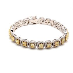 7' Halo tennis bracelet in 18K WG with prong set rounds around (23) radiant cut diamond centers.  D11.11ct.t.w.
