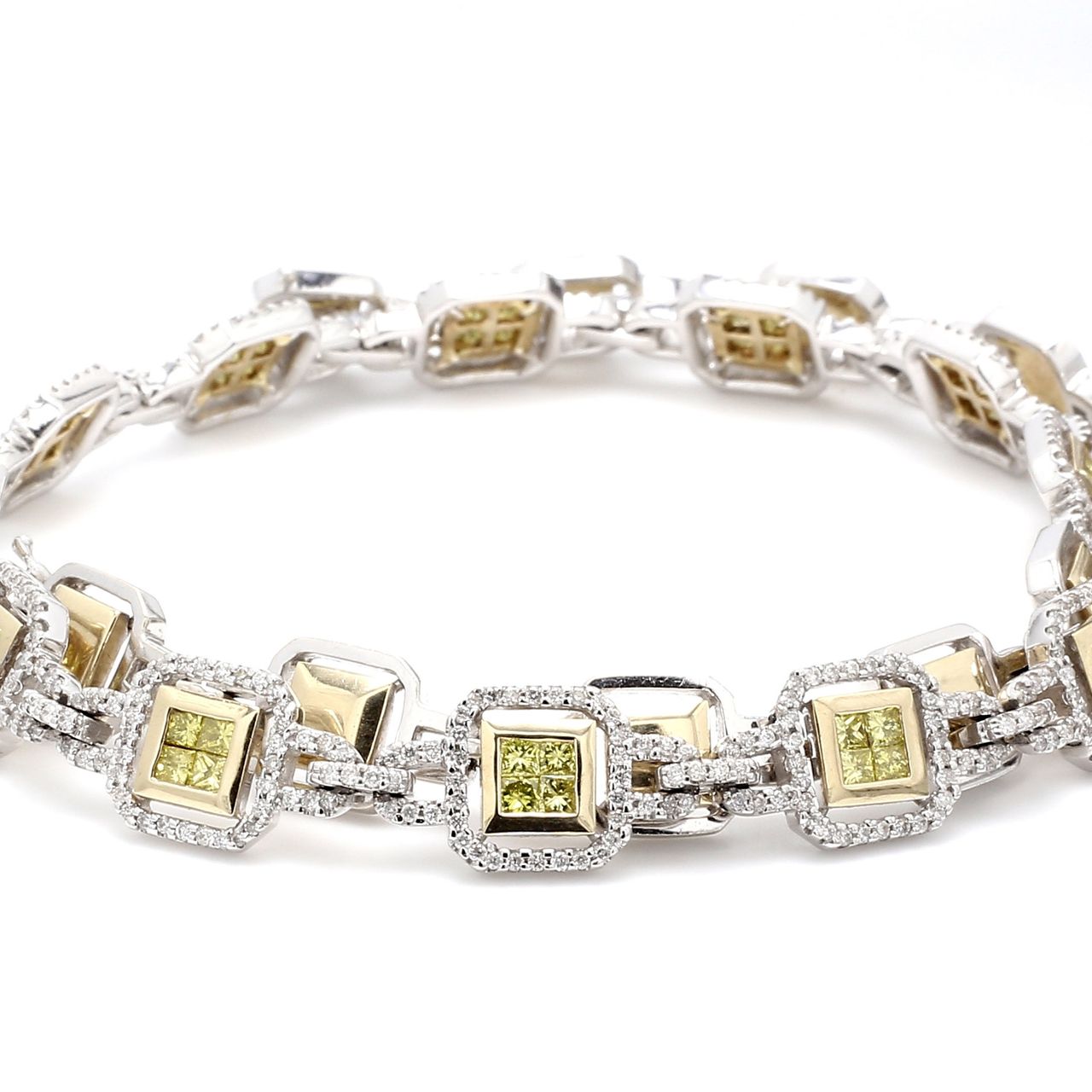 Necklace in 2-tone with rounds & 12 links of 2x2 princess cut fancy yellow diamonds.  D6.05ct.t.w.