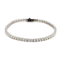 7' Tennis bracelet with 4-prong basket set (61) round diamonds.  D5.52ct.t.w.
