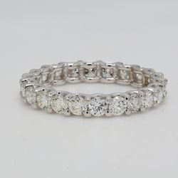 Eternity band with U-prong set (17) round diamonds.  D4.04ct.t.w.  Size 5.5