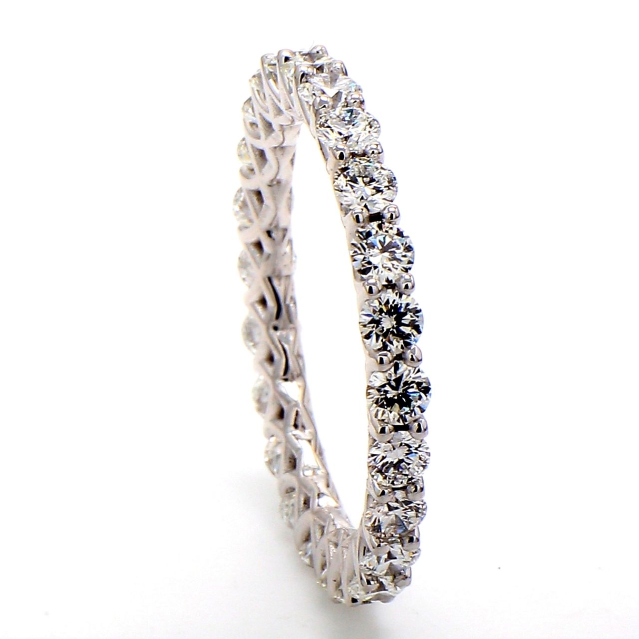 Eternity band in platinum with U-prong set (24) round diamonds.  D2.51ct.t.w.  Size 9.5