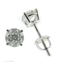 Screw back stud earrings with basket prong set round diamonds.   D0.60ct.t.w.