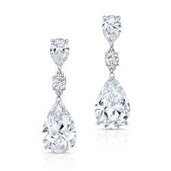 Dangling earrings with GIA certified G/SI2 pear shape diamonds.  D3.11ct.t.w.
