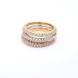 Stackable tri-color band with shared prong set (54) round diamonds.  D0.84ct.t.w.