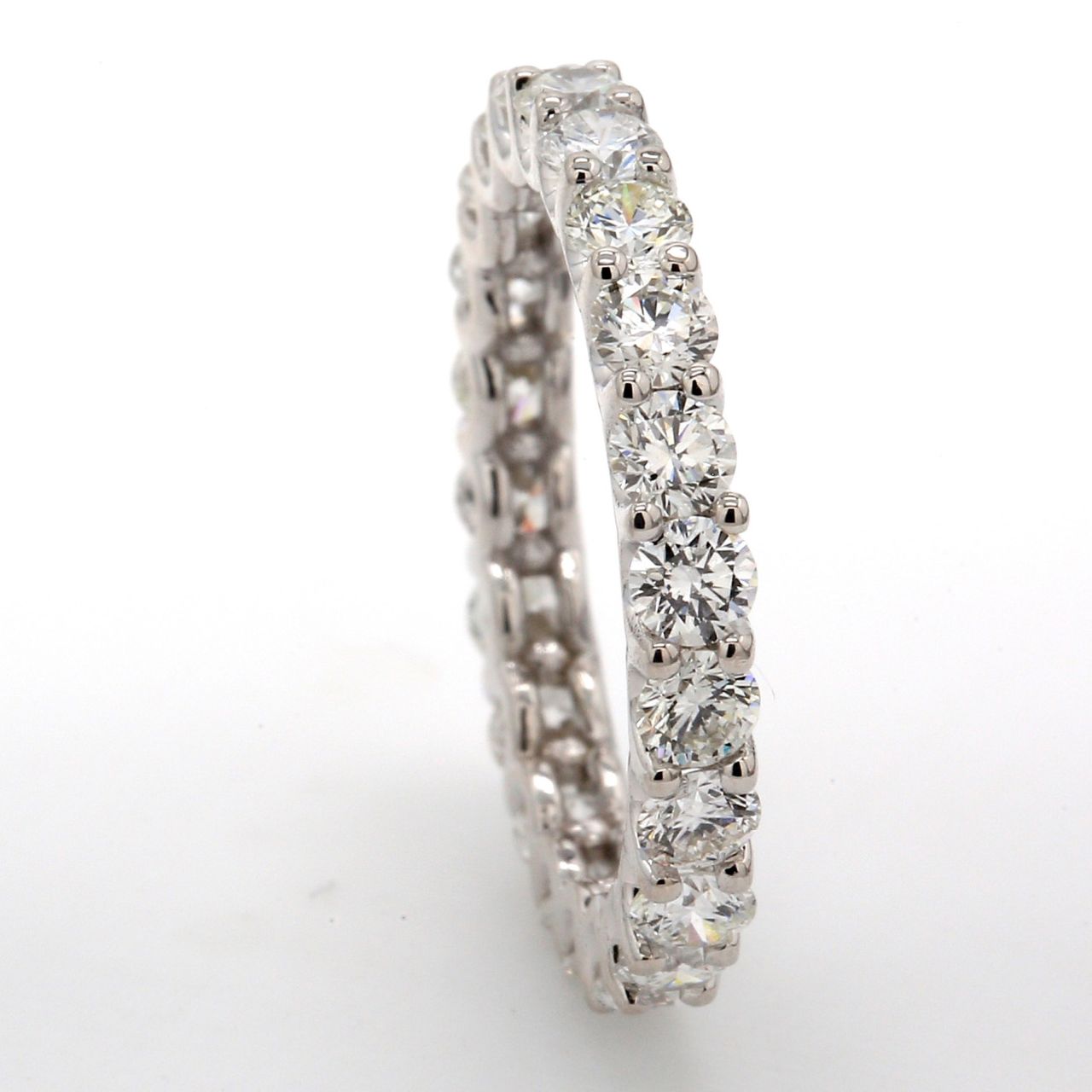 Eternity band in 18K EG with U-prong set (22) round diamonds.  D1.77ct.t.w.  Size 5