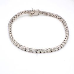 7.25' Tennis bracelet with 4-prong set (53) round diamonds.  D6.54ct.t.w.