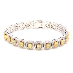 7' Halo tennis bracelet in 18K WG with prong set rounds around FY cushion cut diamond centers.  D10.43ct.t.w.