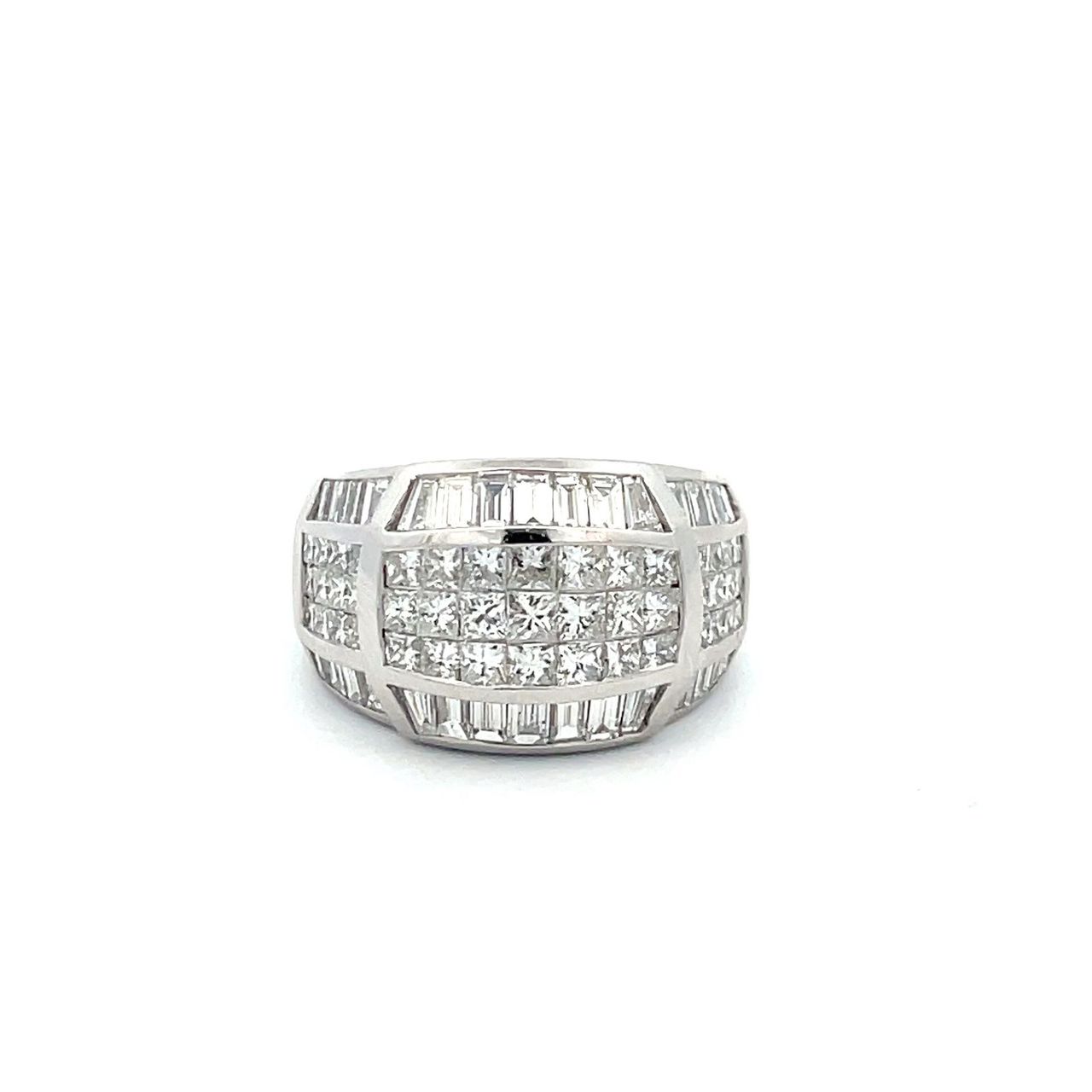 Dome style band with 3-row invisible set princess cuts and channel set baguette diamonds.  D3.72ct.t.w.