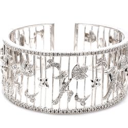 Tulip flower design cuff in 18K WG with round diamonds.  D1.40ct.t.w.