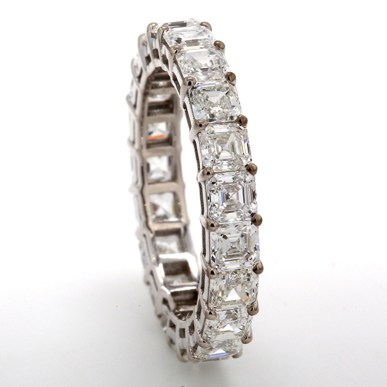 Eternity band in 18K WG with basket prong set (21) asscher cut diamonds.  D4.19ct.t.w.  Size 6.75