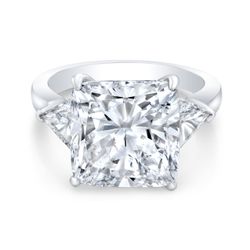 3-stone semi-mount in platinum with trilliant cut diamond sides.  D1.27ct.t.w.