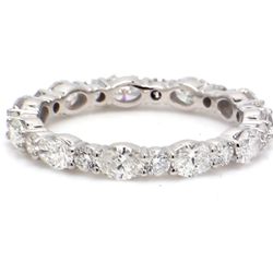 Eternity band in 18K WG with alternating pront set (11) oval cut and 11 round diamonds.  D1.99ct.t.w.  Size 7