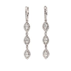 Dangling earrings with prong set marquise and round diamonds.  D1.96ct.t.w.