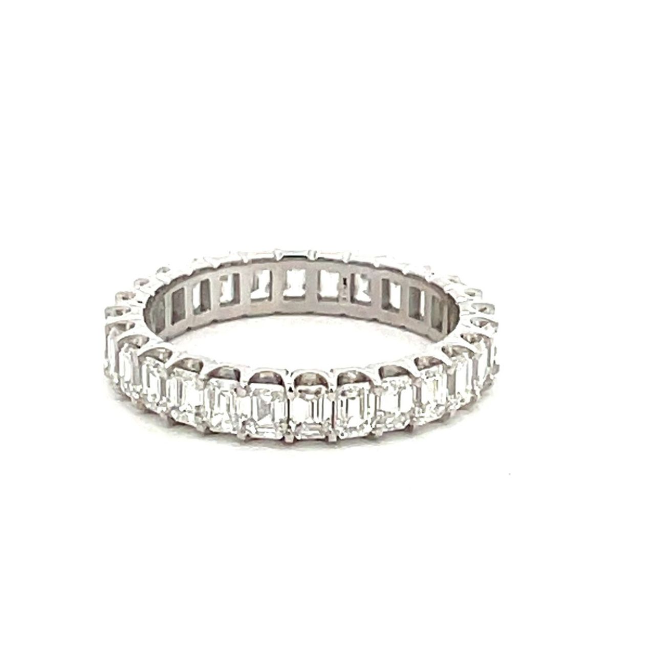 Eternity band in platinum with prong set (28) emerald cut diamonds.  D3.00ct.t.w.