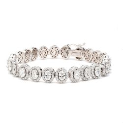 7' Halo tennis bracelet with pave set rounds around prong set (24) oval diamonds.  D9.39ct.t.w.