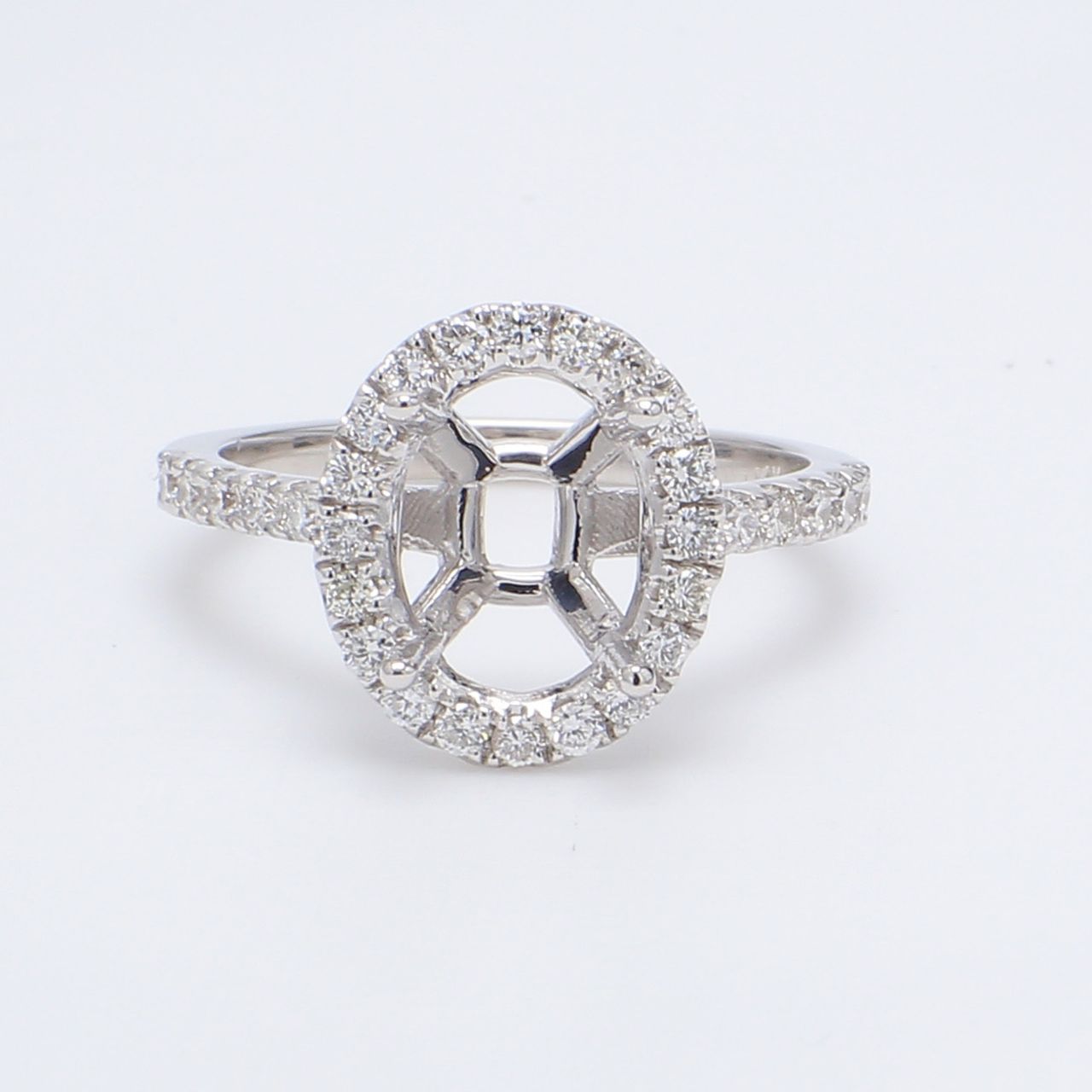 Halo semi-mount with shared prong set round diamonds.  D0.50ct.t.w.