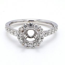 Halo semi-mount with prong set round diamonds.  D0.73ct.t.w.  Size 6.5