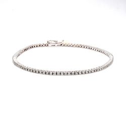 7' Tennis bracelet in 1K WG 4-prong set (69) round diamonds.  D3.26ct.t.w.