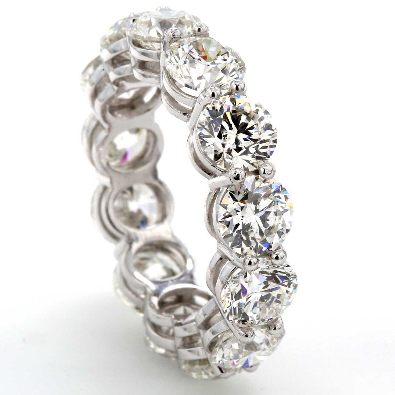 Eternity band in platinum with shared prong set (13) round diamonds.  D9.26ct.t.w.  Size 7.25