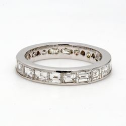 Eternity band with channel set (20) baguette diamonds.  D3.12ct.t.w.  Size 5.75
