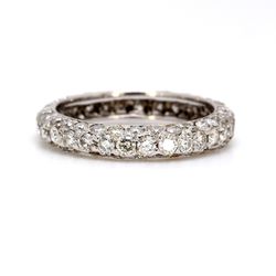 Eternity band with pave & prong set round diamonds.  D1.40ct.t.w.  Size 4.75