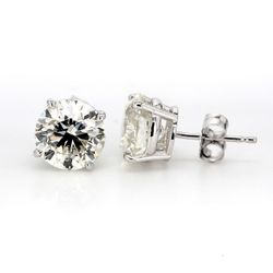 Push back stud earrings with basket 4-prong set GIA certified J/SI2 round diamonds.  D4.02ct.t.w.