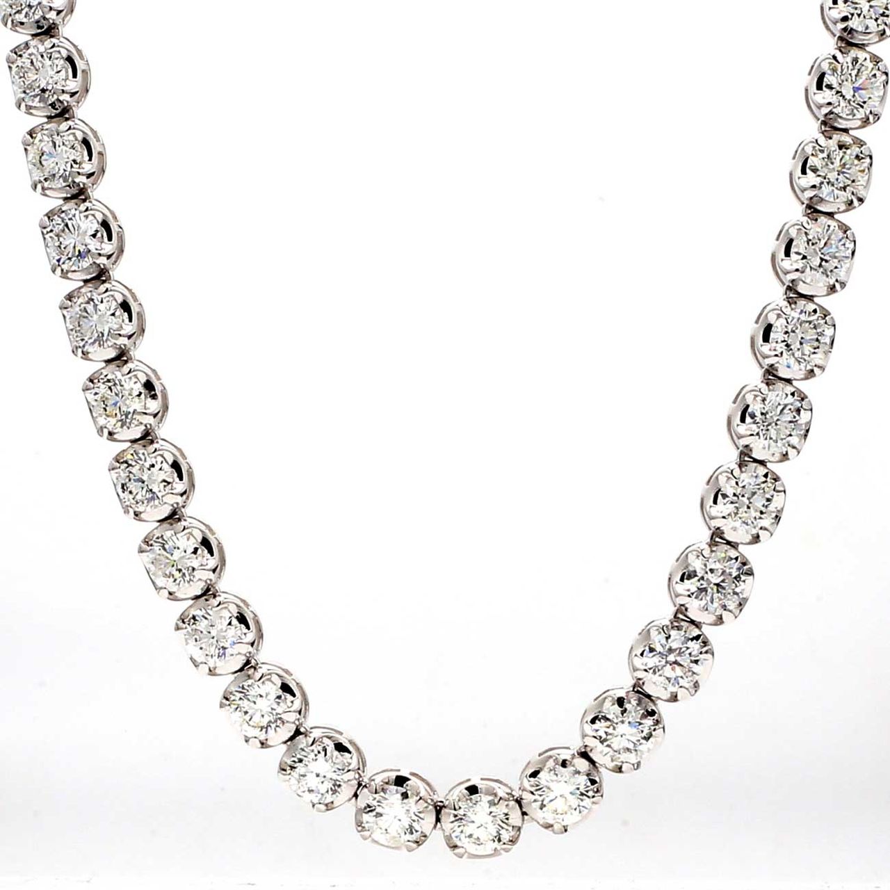 18' Tennis necklace with illusion head 4-prong set (133) round diamonds.  D6.73ct.t.w.