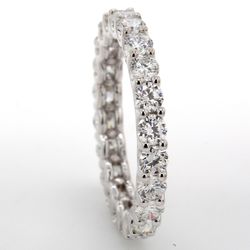 Eternity band in 18K WG with U-prong set (23) round diamonds.  D1.86ct.t.w.  Size 5.25